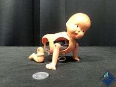 Vintage Mechanical Wind Up Crawling Baby