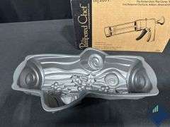 Pampered Chef Cookie Press, Yule Log Cake Mold, and Cook Books