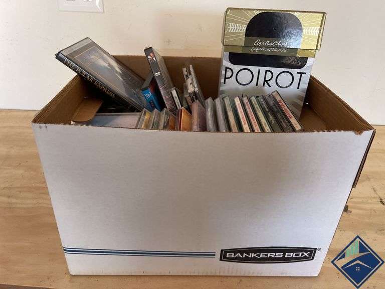 Box of CDs and DVDs