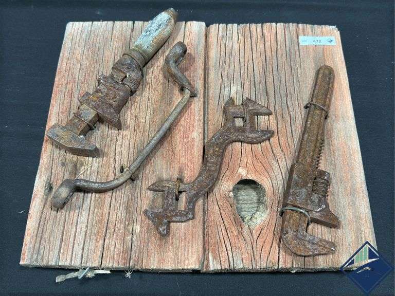 Rustic Wall Plaque with Rusted Tool