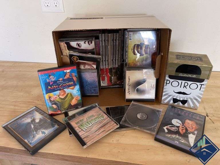 Box of CDs and DVDs