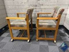 Mid Century Upholstered Chairs on Wheels
