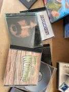 Box of CDs and DVDs