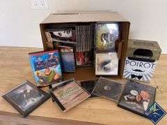 Box of CDs and DVDs