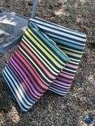 Metal Folding Chair, Seat Cushions, Small Metal Rake, etc.