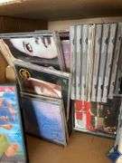 Box of CDs and DVDs
