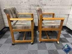Mid Century Upholstered Chairs on Wheels