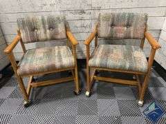 Mid Century Upholstered Chairs on Wheels