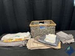 Basket Full of Tablecloths, Runners, and Napkins