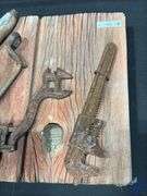 Rustic Wall Plaque with Rusted Tool
