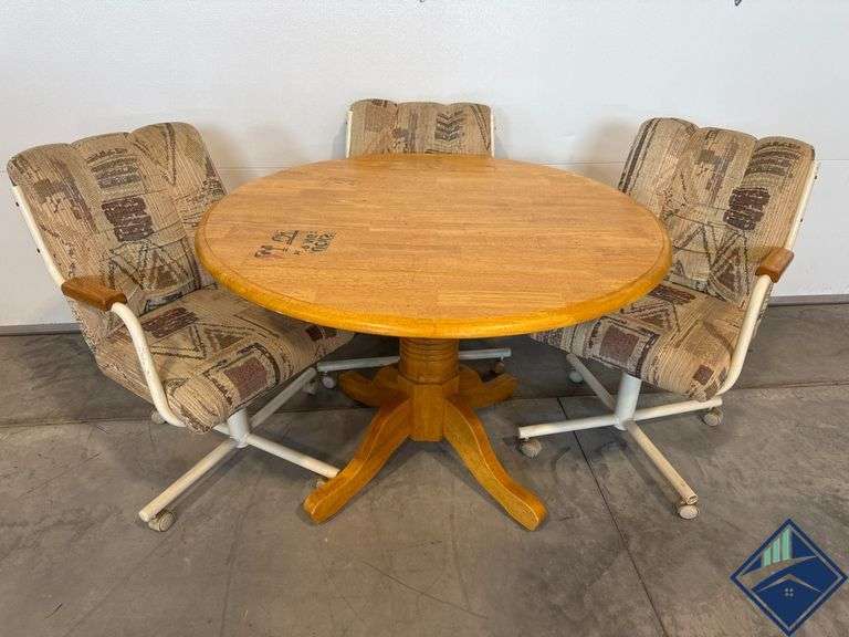 Wood Pedestal Table With Three Upholstered Swivel Chairs