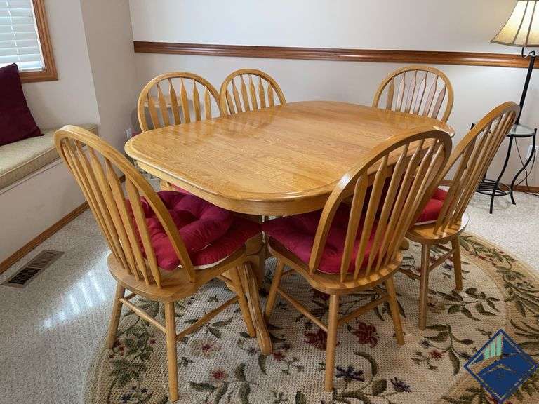 Oak Dining Table with Six Matching Chairs and (2) 24” leafs *upstairs*