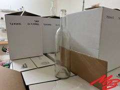 74 Cases of White Wine Bottles