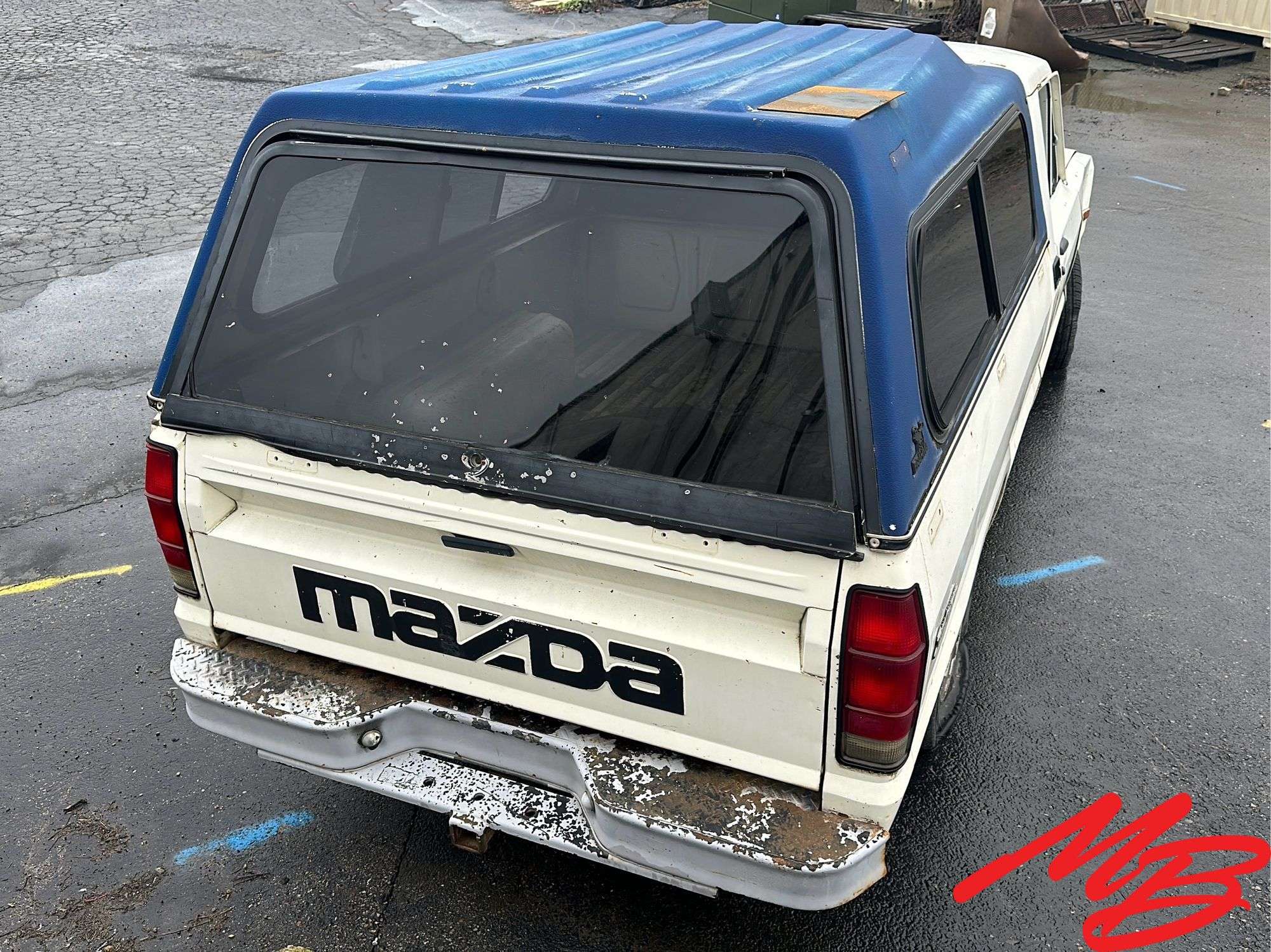 Mazda B2000 with Canopy - Musser Bros Inc