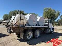 1986 White Flatbed Truck w/ (2) 925 Gallon Fertilizer Tanks and (1) 535 Gallon Fertilizer Tank