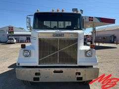 1986 White Flatbed Truck w/ (2) 925 Gallon Fertilizer Tanks and (1) 535 Gallon Fertilizer Tank