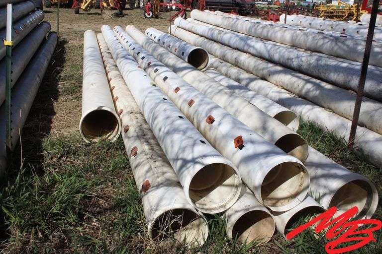 Pile of Assorted Plastic Gated Pipe, 10" & 12", Various Lengths