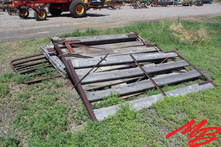 (6) Weathered Wooden Gates 8' +/-; (1) 12' Metal Gate