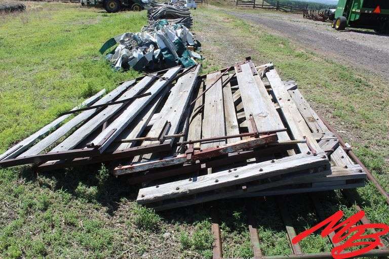 (6) Weathered Wooden Gates 8' +/-; (1) 12' Metal Gate
