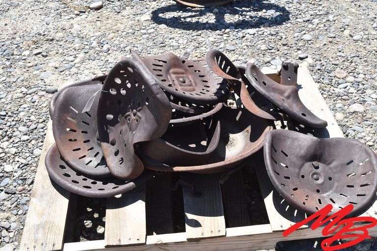 Pallet Lot of Antique Tractor Seats