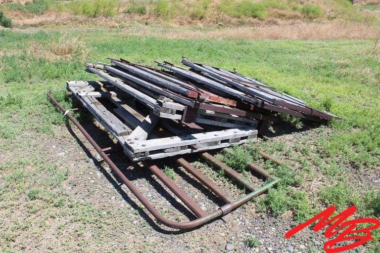 (6) Weathered Wooden Gates 8' +/-; (1) 12' Metal Gate