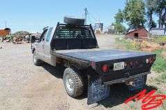 1999  Ford  F350 Super Duty XLT  Extended Cab 4X4 Flatbed Pickup
