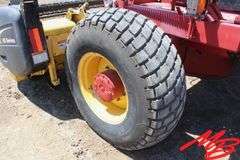New Holland  HW300 Swather w/ NH Haybine HS Series 12' Header