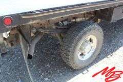 1999  Ford  F350 Super Duty XLT  Extended Cab 4X4 Flatbed Pickup