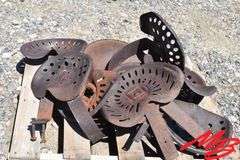 Pallet Lot of Antique Tractor Seats