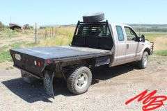 1999  Ford  F350 Super Duty XLT  Extended Cab 4X4 Flatbed Pickup