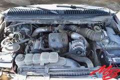 1999  Ford  F350 Super Duty XLT  Extended Cab 4X4 Flatbed Pickup