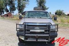 1999  Ford  F350 Super Duty XLT  Extended Cab 4X4 Flatbed Pickup