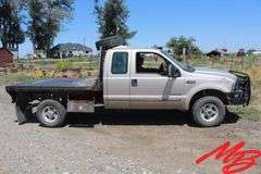 1999  Ford  F350 Super Duty XLT  Extended Cab 4X4 Flatbed Pickup