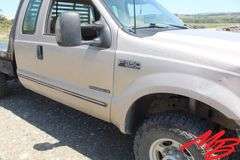 1999  Ford  F350 Super Duty XLT  Extended Cab 4X4 Flatbed Pickup