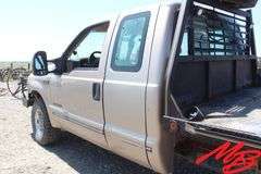 1999  Ford  F350 Super Duty XLT  Extended Cab 4X4 Flatbed Pickup