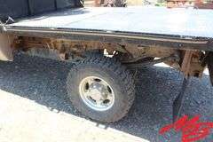 1999  Ford  F350 Super Duty XLT  Extended Cab 4X4 Flatbed Pickup