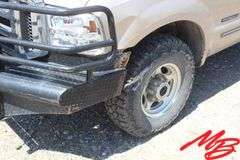 1999  Ford  F350 Super Duty XLT  Extended Cab 4X4 Flatbed Pickup