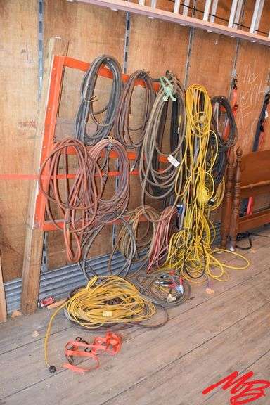 Assorted extension cords, air hose & jumper cables
