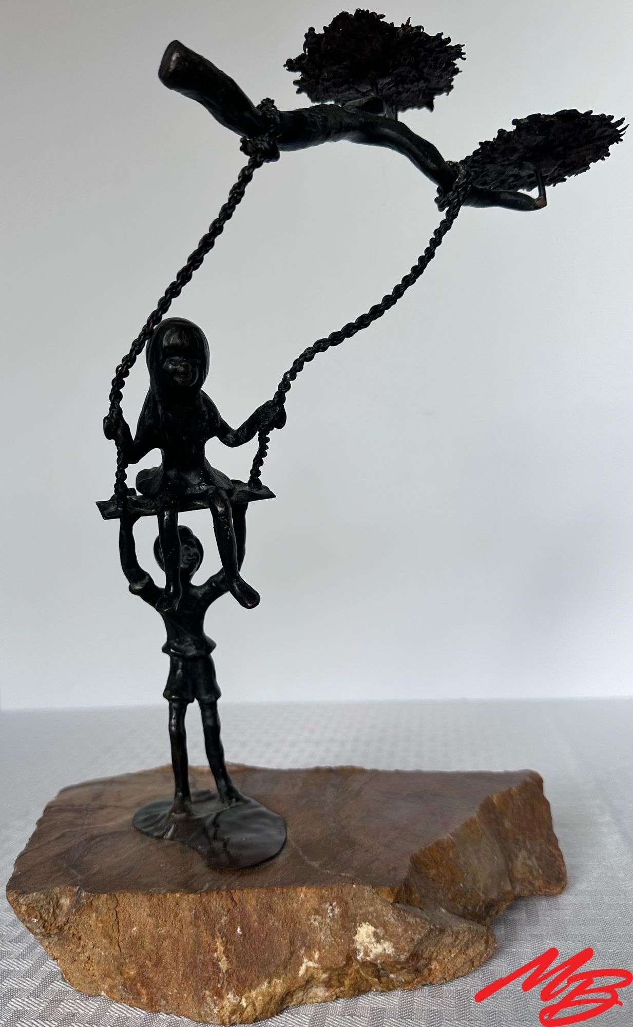Kids Playing on Swing. Metal, 8-1/2"W x 12-3/4"H x 8"D