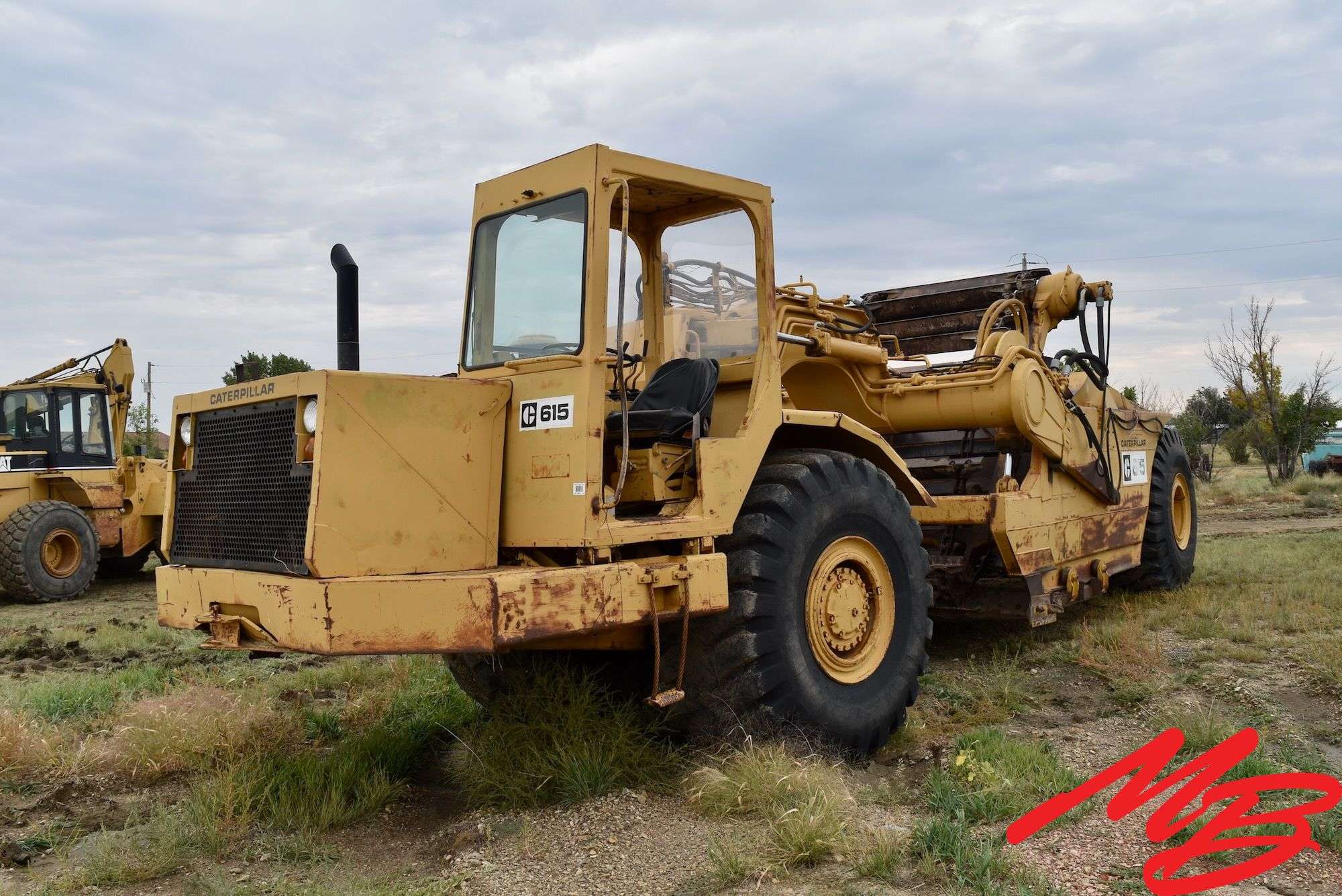 1984  CAT   615  Paddle Scraper