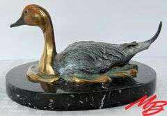 Duck by Geoffrey C. Smith. Bronze, 37/48, 7-1/2"W x 3-3/4"H x 5-1/2"D