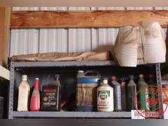 Steel Shelf w/Assorted Oils, etc.