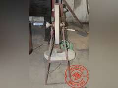 Old Stone Grinder